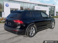 This Volkswagen Tiguan delivers a Intercooled Turbo Regular Unleaded I-4 2.0 L/121 engine powering t... (image 4)