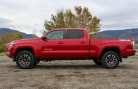 The 2021 Toyota Tacoma 4x4 Double Cab Auto is a striking truck that demands attention, dressed in a... (image 6)