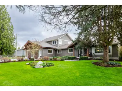 Welcome to this beautiful Salmon River updated & modernized home perfect for two families. The main...