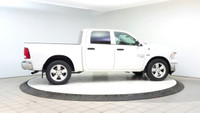 The Ram 1500 Classic SLT, presented in a striking white, is a robust and reliable 4x4 truck, ideal f... (image 5)