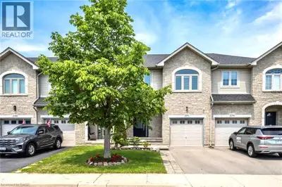 This move-in ready 3-bedroom, 2.5-bath freehold townhome in Burlington’s Orchard community features...