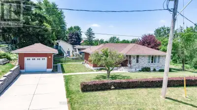 One of a kind! This 1200 square foot bungalow is truly irreplaceable. Situated on an elevated lot at...