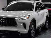 Elevate your driving experience in the sophisticated 2025 INFINITI QX60 Pure, finished in striking G... (image 1)