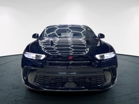 Introducing the 2024 Dodge Hornet GT AWD, a dynamic SUV that commands attention with its black-on-bl... (image 6)