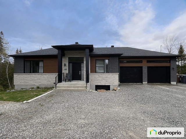 $1,149,900 - Bungalow for sale in Ste-Julienne — photo 1