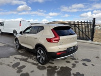 Turbocharged All Wheel Drive Keyless Entry Discover the 2025 Volvo XC40 Plus Bright Theme, a stylish... (image 5)