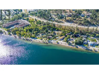 Discover nearly four acres of prime semi-waterfront property in the heart of the Okanagan, offering...