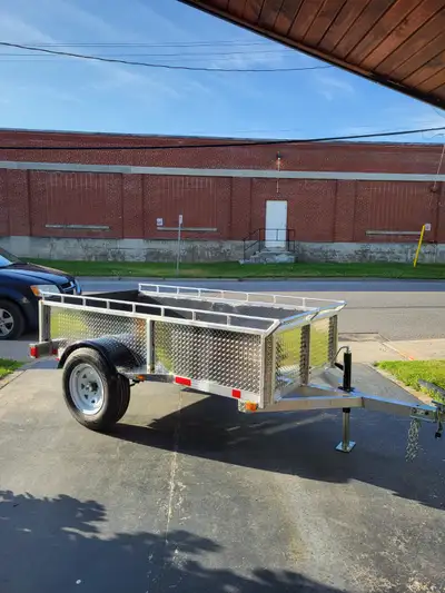 Brand new with 3500 LBS capacity. 15" wheels. tie downs inside of box. Has 2" ball coupler and heavy...