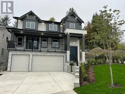 Cedar Crest - The brand-new, stunning residence boasts 6 bedrooms + 5 baths, legal suite, & triple g...