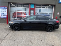 HERE IS A NICE CLEAN ACCIDENT FREE FORD SEDAN FOR YOU IT LOOKS AND DRIVES GREAT AND SOLD CERTIFIED C... (image 6)