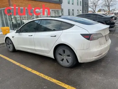 Power Tailgate/Hatch, Auto Dimming Rearview Mirror, Front Heated Seats and more! Clutch is the large...