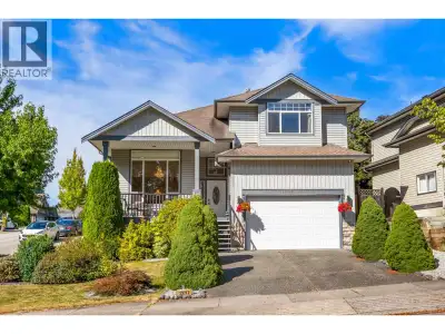 Over 3,700 sqft of luxury. Stylishly renovated corner property in prestigious Rainbow Ridge Estates'...