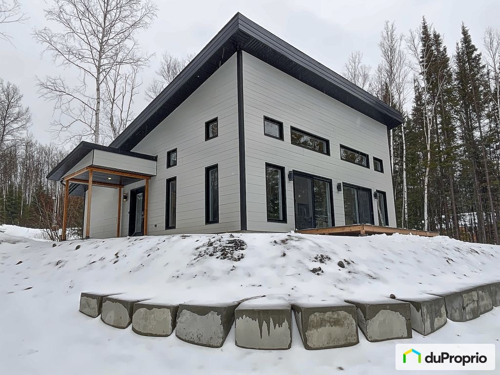 $589,000 - Bungalow for sale in Ferland-Et-Boilleau — photo 1
