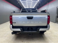 The 2025 Toyota Tacoma SR5, clad in a refined Silver finish, is ready to tackle any terrain with its... (image 7)