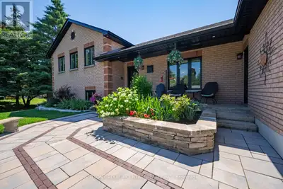 Welcome to this one-of-a-kind custom-built side split home, perfectly situated on a spacious 120x193...