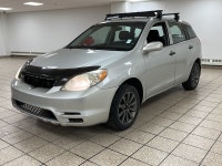 Silver light glances off the Titanium Metallic paint as it moves, the compact hatchback shape cuttin... (image 1)