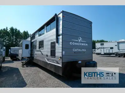 Coachmen Catalina Destination Series Loft 43CONDO destination trailer highlights: Queen Beds Loft Ki...
