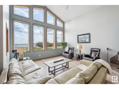 Discover this stunning 7 bedroom waterfront home on Pigeon Lake with almost 3500 sft of developed li...