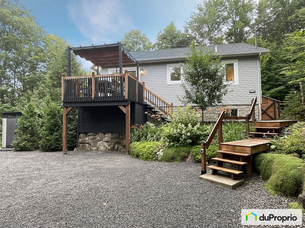 $599,900 - Raised Bungalow for sale in Ste-Adele — photo 1