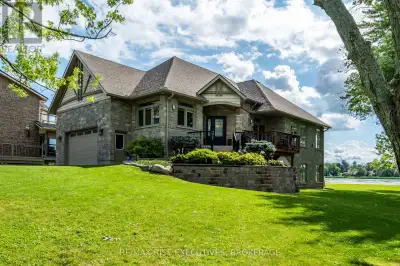 A stunning estate with 90+ ft of waterfront on the Napanee River. Spectacular views and century old...