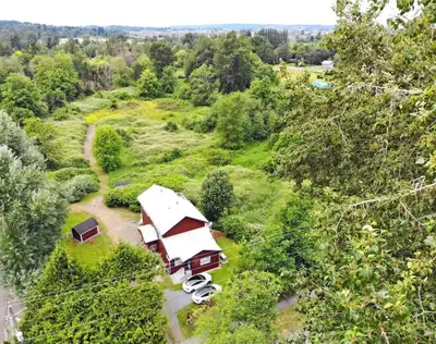 A RARE FIND: Serenity on the edge of the city. This country home, with 4.6 acres of nature, is just...