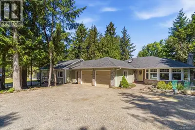 Tucked away in a peaceful and private setting, this exceptional 1.19 acre property offers the perfec...