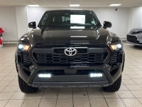 Engineered for drivers who want capability without compromising conscience, this 2025 Toyota Tacoma... (image 7)