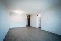 2 BR TypeA Units has a spacious living room, dining room, kitchen with appliances, full bathroom, in... (image 4)