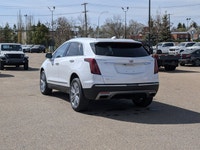 The pre-owned 2024 Cadillac XT5 Premium Luxury AWD in Mary Kay Pearl with a Jet Black interior deliv... (image 3)