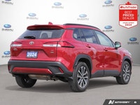 Odometer is 22659 kilometers below market average! Barcelona Red Metallic 2024 Toyota Corolla Cross... (image 4)
