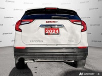Experience the capable performance of the 2024 GMC Terrain SLE, a striking white Sport Utility ready... (image 5)