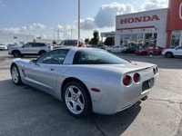 Turn heads in this sleek 1999 Chevrolet Corvette, boasting a stunning Sebring Silver Metallic exteri... (image 8)