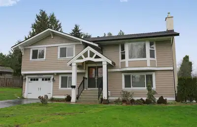 Rare opportunity to own a renovated home on a private 1.04 acre property in prestigious Hazelmere, S...