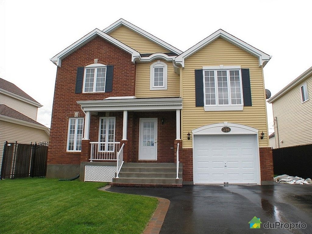 $750,000 - 2 Storey for sale in Chateauguay — photo 1