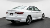 This 2021 Volkswagen Jetta Highline R-Line is a sleek sedan with a sunroof, back camera, and alloy w... (image 6)