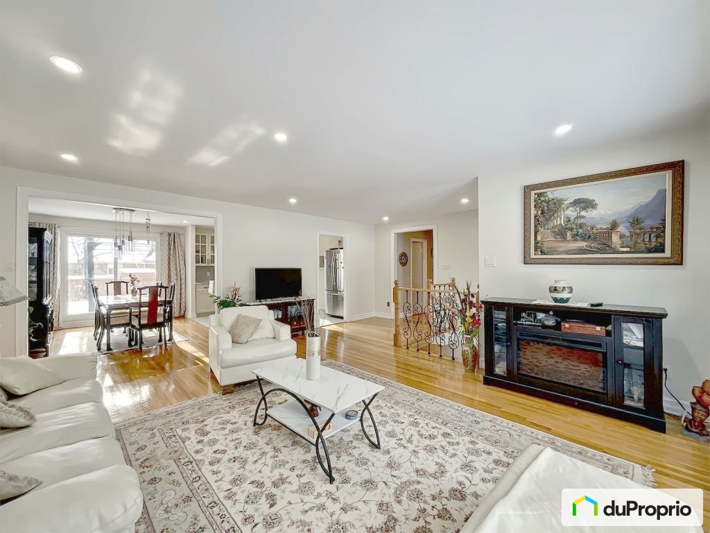 $939,900 - Bungalow for sale in Dollard-Des-Ormeaux — photo 1