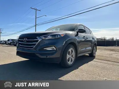 KBB.com 5-Year Cost to Own Awards. This Hyundai Tucson delivers a Regular Unleaded I-4 2.0 L/122 eng...