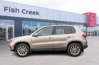 Navigate every road with confidence in this sophisticated 2015 Volkswagen Tiguan Comfortline. Engine... (image 2)