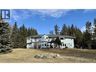 Set on a beautiful 0.65 acre park-like lot overlooking 105 Mile Lake, this grade-level entry home is...