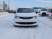 The 2026 Chrysler Grand Caravan SXT in Bright White with a Black interior offers a perfect balance o... (image 9)
