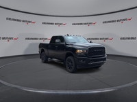Meet the 2023 RAM 2500 Big Horn 4x4 Crew Cab 6'4 Box with the Night Edition package, offered by Hald... (image 1)