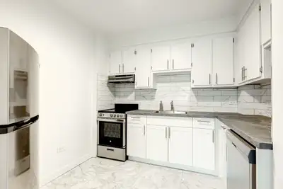 This building offers many features including: - Secured access with surveillance camera - On-site ma...