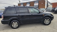 Take on Alberta roads with confidence in this well-equipped 2006 Honda Pilot EX-L! Known for its leg... (image 8)