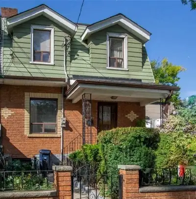 This Furnished 2nd Floor Apartment has a Large Living Room with A Large Window, Hardwood Floors and...