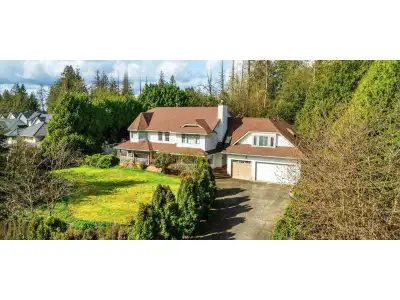 Custom-built home situated on an approximately 0.92-acre private lot in a quiet cul-de-sac, surround...
