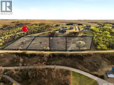 Welcome to Berry Hills Estates, where opportunity meets breathtaking beauty. Perched above Katepwa L...