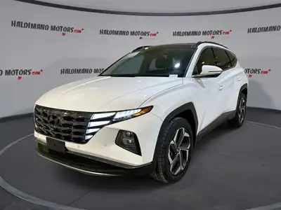Experience efficient power and upscale comfort in this used 2023 Hyundai Tucson Hybrid Ultimate AWD,...