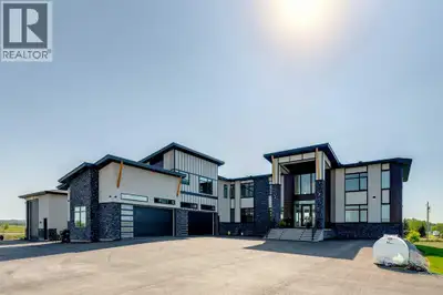 Located only eight minutes from Calgary and across the street from the Carnmoney Golf & Country Club...