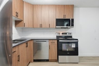 Amenities: Gym and Community Room • City Views • Heat & Water Included Suite & Building: Spacious on... (image 3)