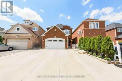 Stunning fully renovated 4-bedrooms detached home with a finished rental basement, backing onto a pa...